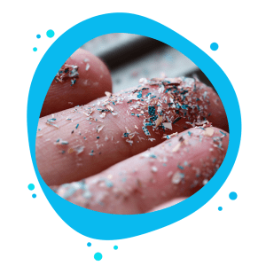 An image showing microplastics in a hand.